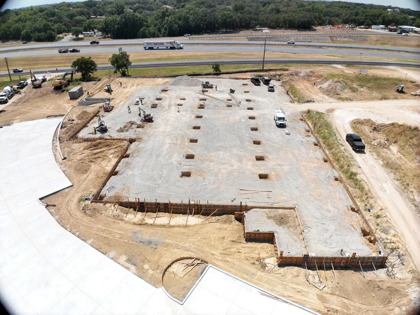 Aerial view of the Adobe Interiors site with foundation piers placed